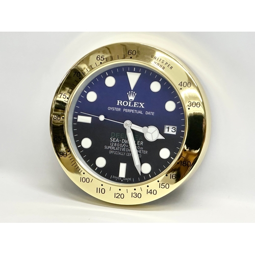 1002 - A Rolex Oyster Perpetual Date Deepsea Sea-Dweller advertising clock. 34cm