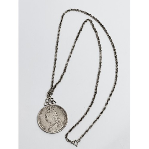 776C - A silver crown with silver chain, 44 grams. Dated 1889.    (8)