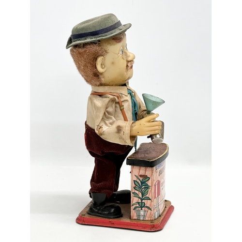 511 - A Mid 20th Century Charley Weaver Bartender. 30cm