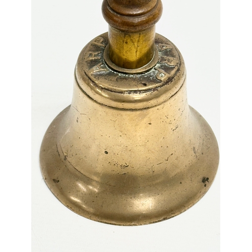 515 - A British WWII gunmetal Air Raid Precautions bell. 28cm