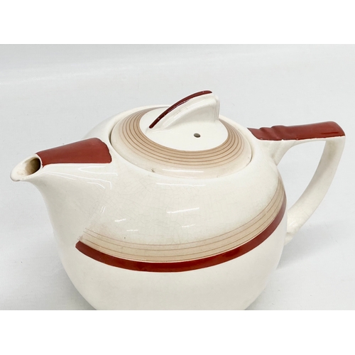 537 - W. R. Midwinter. A 1940’s Art Deco teapot. 22x14x14cm