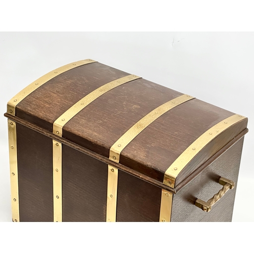 508 - A Mid 20th Century oak and brass bound dome top coal bin/log box. 52x32x39cm