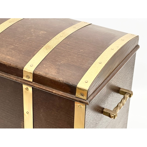 508 - A Mid 20th Century oak and brass bound dome top coal bin/log box. 52x32x39cm