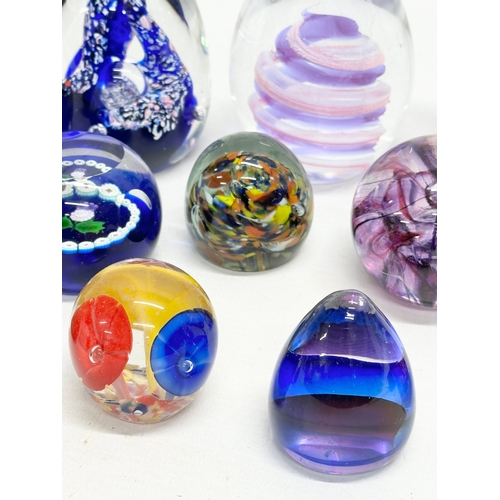 530 - A collection of art glass paperweights. Spencer & Wallace, Caithness etc