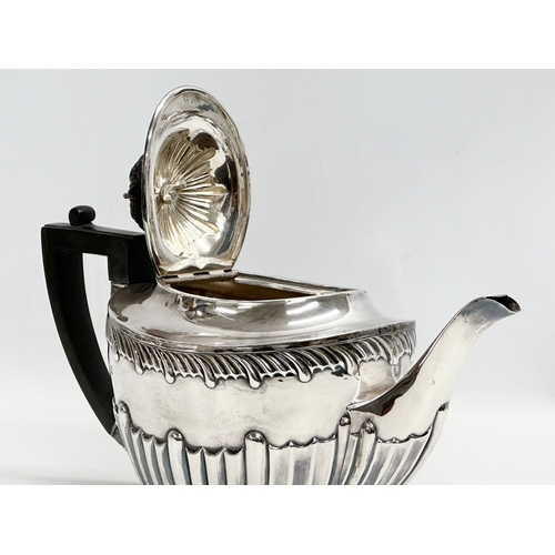 592 - L.A.W. A Late 19th Century silver teapot. London, 1895. 540.5g. 28x11x18cm