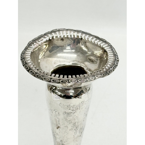 606 - An Early 20th Century silver rose vase. Phillip Ashberry & Sons, Sheffield, 1912. Filled. 16cm