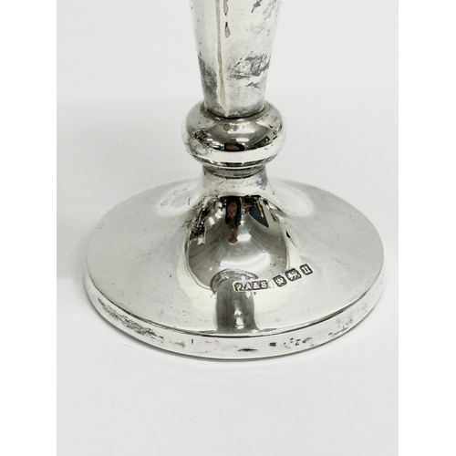 606 - An Early 20th Century silver rose vase. Phillip Ashberry & Sons, Sheffield, 1912. Filled. 16cm