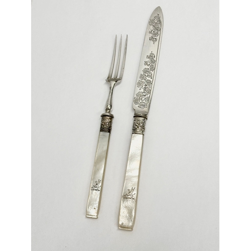 552 - A set of 12 Early 20th Century silver plated cutlery with mother of pearl handles.