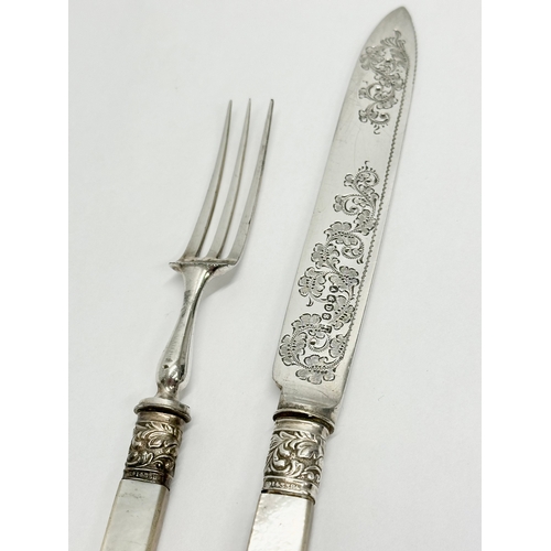 552 - A set of 12 Early 20th Century silver plated cutlery with mother of pearl handles.