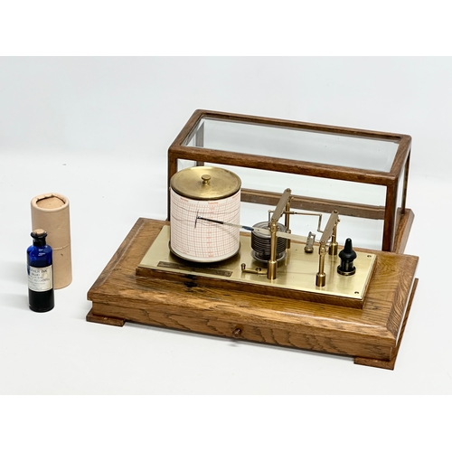 514 - Negretti & Zambia. A good quality oak cased barograph. Jewelled movement. Regency Barograph.