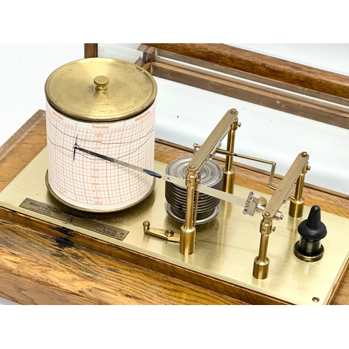 514 - Negretti & Zambia. A good quality oak cased barograph. Jewelled movement. Regency Barograph.