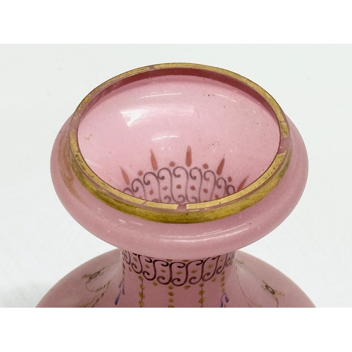 448 - A Late 19th/Early 20th Century painted frosted pink glass vase. 12x15cm