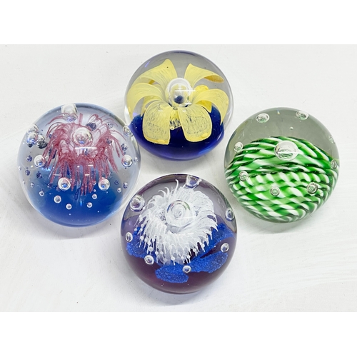 582 - 4 large art glass paperweights