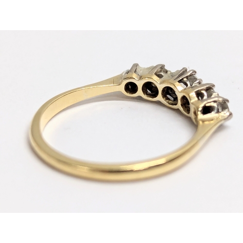 619 - An 18ct gold eternity ring with 5 diamonds. Total weight 2.5g. UK size P