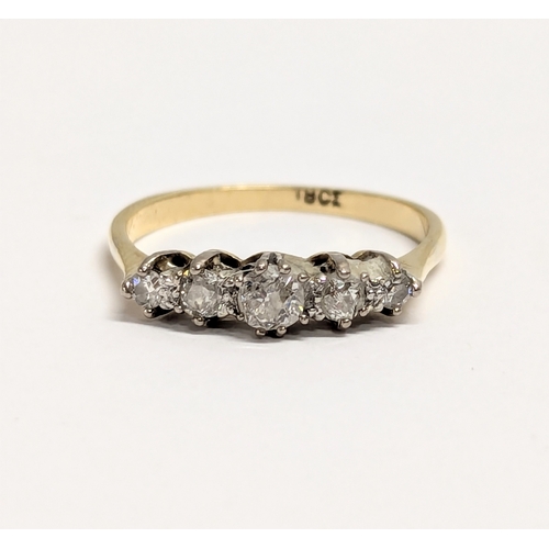 619 - An 18ct gold eternity ring with 5 diamonds. Total weight 2.5g. UK size P