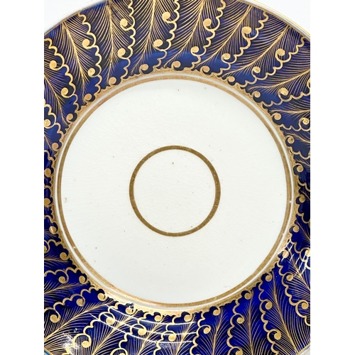 437 - A Late 18th Century English gilt footed plate on and cobalt blue ground. Derby/Coalport. 23x3cm