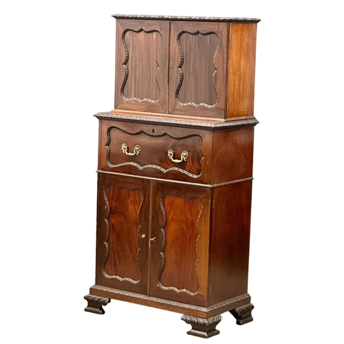 396 - An Early 20th Century Chippendale Revival mahogany secretaire cabinet, with pigeon hole shelves and ... 