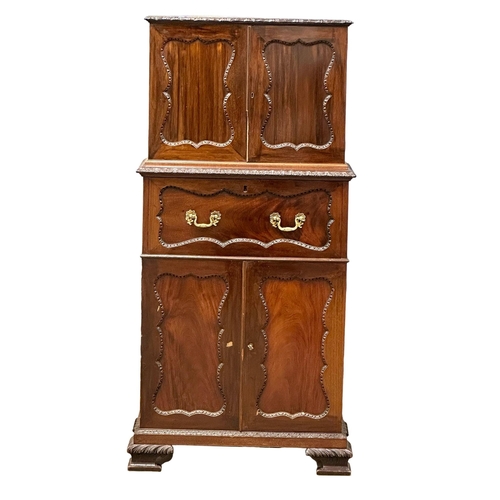 396 - An Early 20th Century Chippendale Revival mahogany secretaire cabinet, with pigeon hole shelves and ... 