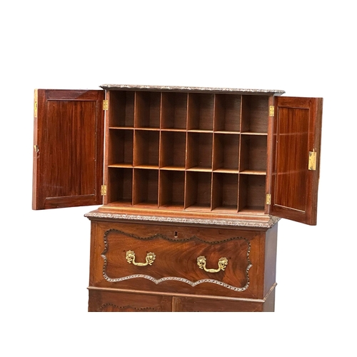 396 - An Early 20th Century Chippendale Revival mahogany secretaire cabinet, with pigeon hole shelves and ... 