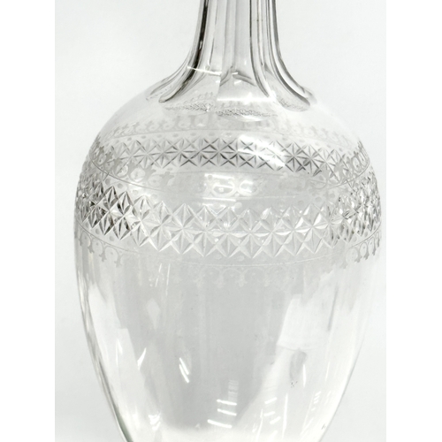 451 - A fine quality 19th Century etched and star cut decanter. Mid/Late 19th Century. 29cm