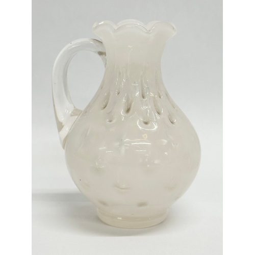 841 - A small Early/Mid 20th Century opaline glass jug. 13cm