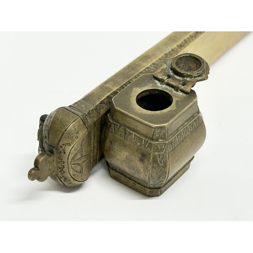 378 - A Late 19th Century Turkish Ottoman brass pen and ink case. 22.5cm