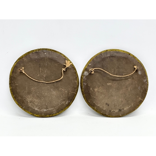 411 - A pair of Early/Mid 19th Century jasper style relief, putti wall plaques in cloth covered frames. 18... 