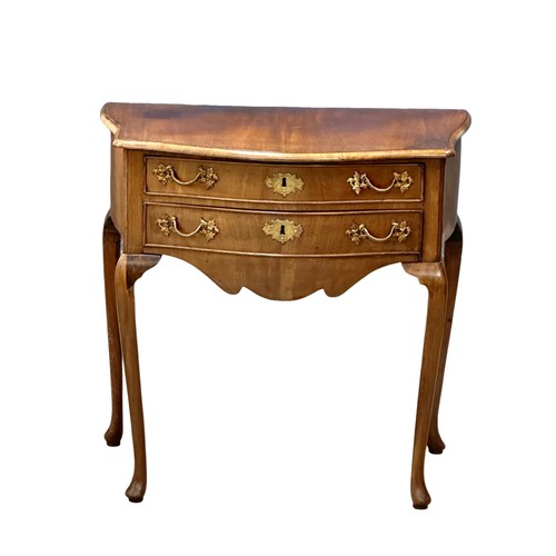 400 - A Late 18th/Early 19th Century North European, serpentine front lowboy. Circa 1790-1810. 76x46x73.5c... 