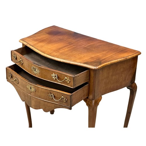 400 - A Late 18th/Early 19th Century North European, serpentine front lowboy. Circa 1790-1810. 76x46x73.5c... 