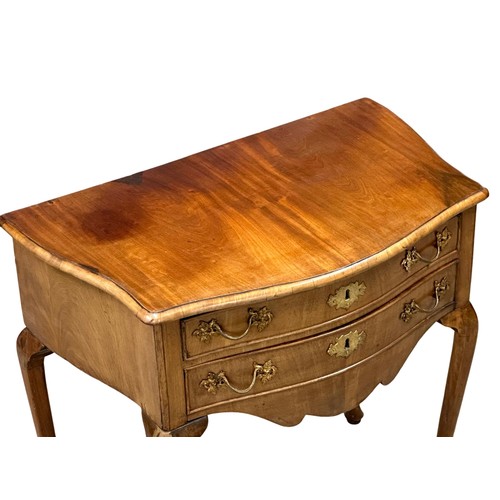 400 - A Late 18th/Early 19th Century North European, serpentine front lowboy. Circa 1790-1810. 76x46x73.5c... 