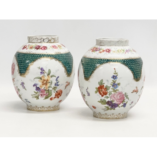 471 - A pair of 19th Century porcelain jars. Meissen style. 1 with cover. 14x18cm without cover.