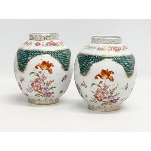 471 - A pair of 19th Century porcelain jars. Meissen style. 1 with cover. 14x18cm without cover.