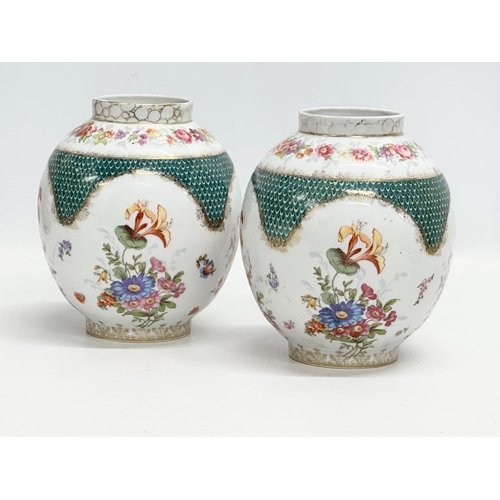 471 - A pair of 19th Century porcelain jars. Meissen style. 1 with cover. 14x18cm without cover.