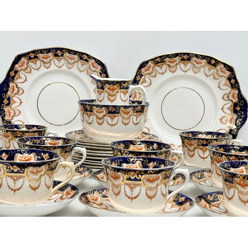 413 - A 1920’s Royal Albert “Heirloom” tea service. 34 piece.