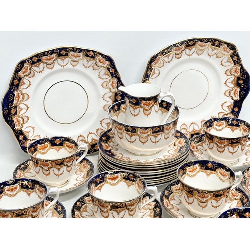 413 - A 1920’s Royal Albert “Heirloom” tea service. 34 piece.