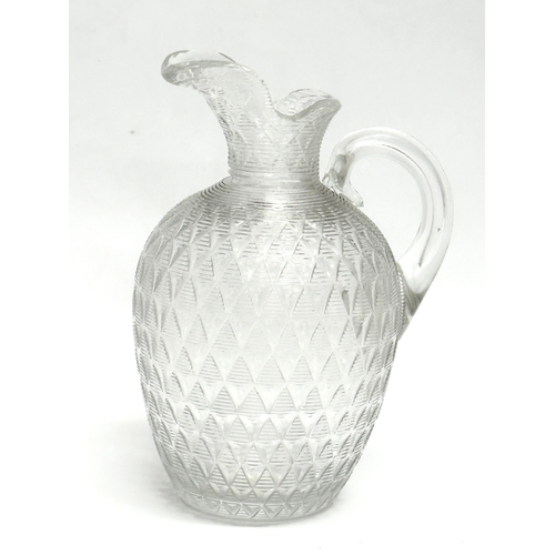 872 - Two 19th Century glass jugs. 13cm. 10cm.