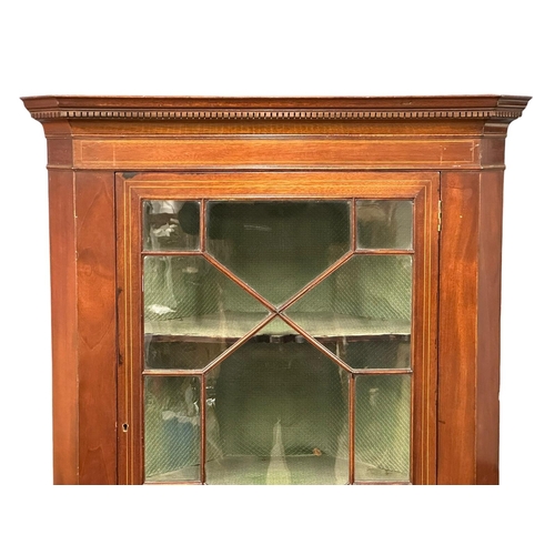 846 - A Mid/Late 19th Century Sheraton Revival inlaid mahogany corner cabinet in the George III style. Cir... 