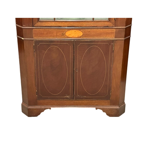 846 - A Mid/Late 19th Century Sheraton Revival inlaid mahogany corner cabinet in the George III style. Cir... 