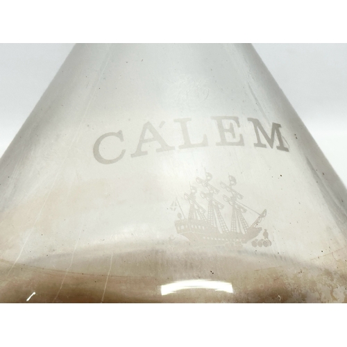 875 - A Mid 20th Century Cálem Port glass ships style decanter. 15x25cm