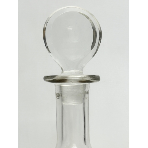 875 - A Mid 20th Century Cálem Port glass ships style decanter. 15x25cm