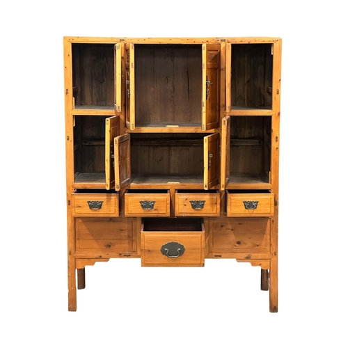 379 - A large 20th Century Chinese multi cupboard cabinet, with 5 drawers. 140x57x181.5cm.