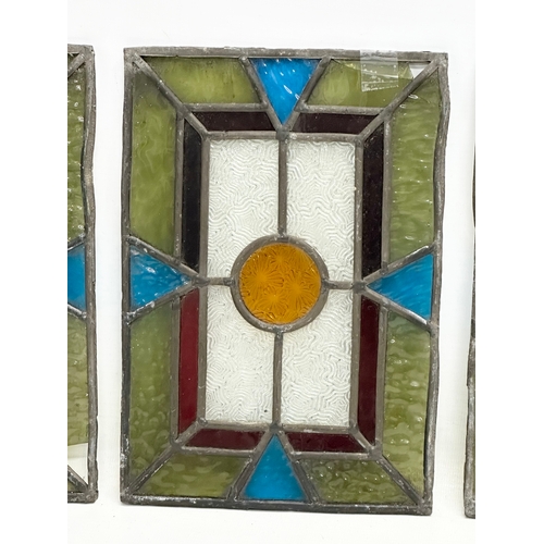 573 - A set of 4 Late 19th Century stained glass panels. 17x24.5cm