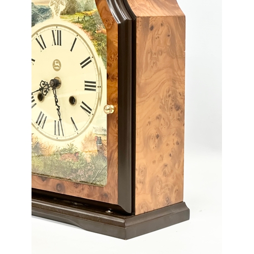 812 - Conrad Franz. A Late 20th Century mantle clock. The Wildlife Clock. 27x11x37cm