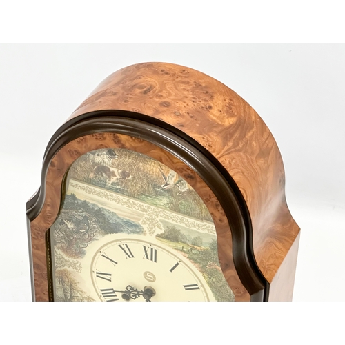 812 - Conrad Franz. A Late 20th Century mantle clock. The Wildlife Clock. 27x11x37cm