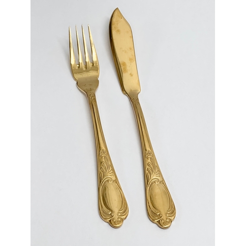 426 - A SBS 24k gold plated canteen of cutlery.