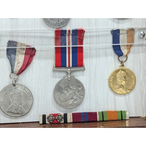 567 - A collection of vintage military medals, including First World War George V silver medal. World War ... 