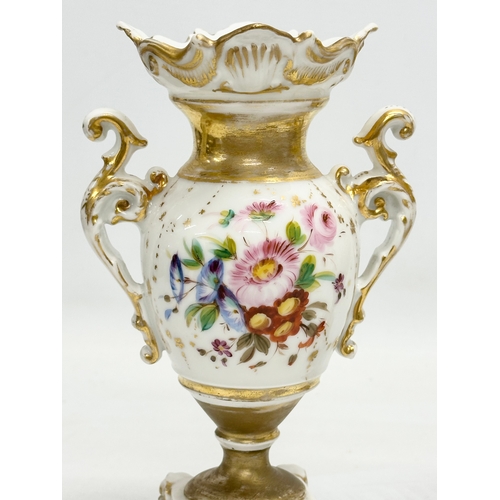 420 - A pair of Early 19th Century hand painted porcelain vases. 19cm