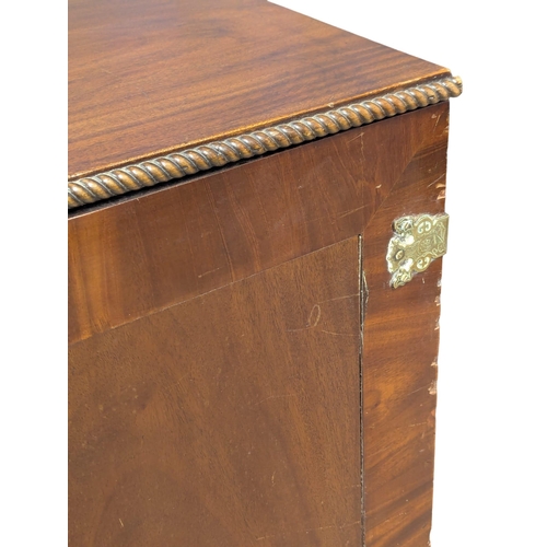 794 - A large Early 20th Century Chippendale Revival mahogany linen cupboard. 126x49x100cm