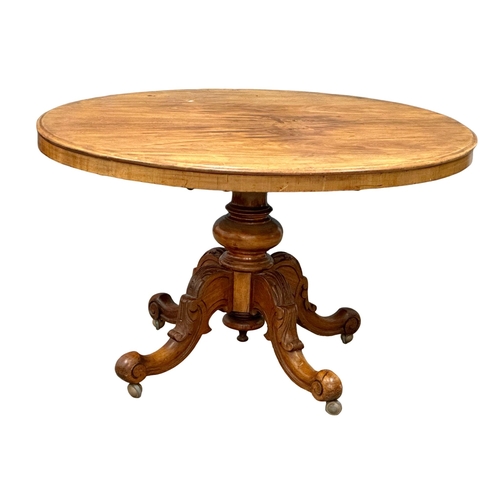 480 - A 19th Century Victorian mahogany tilt top breakfast table/dining table in carved pedestal base. 133... 