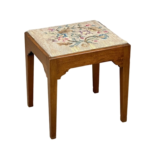 951 - A Late 19th Century George III style mahogany footstool. 46x40x49cm. (6)